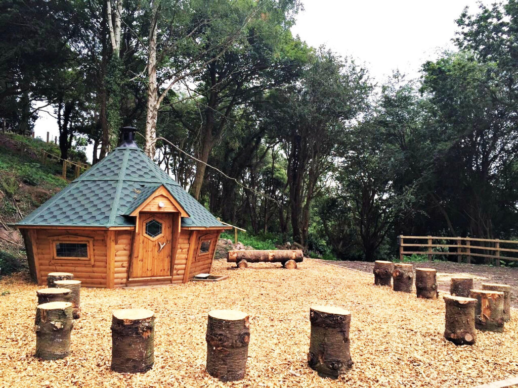 Willow Den's example of what an outdoor wooden cabin looks like